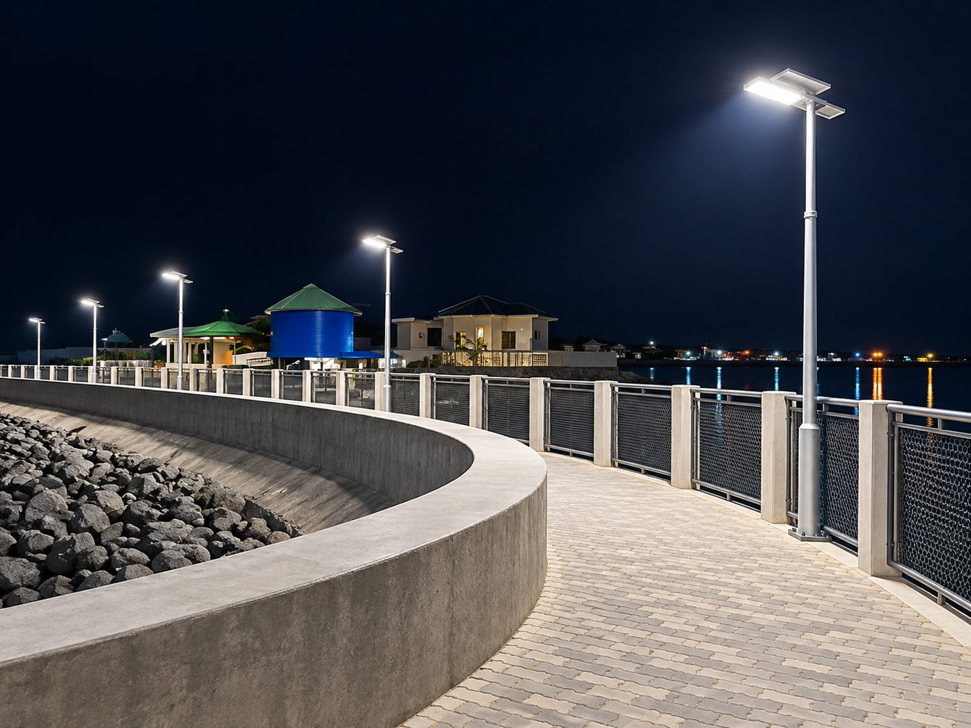 Solar street lighting installed along a waterfront promenade at night
